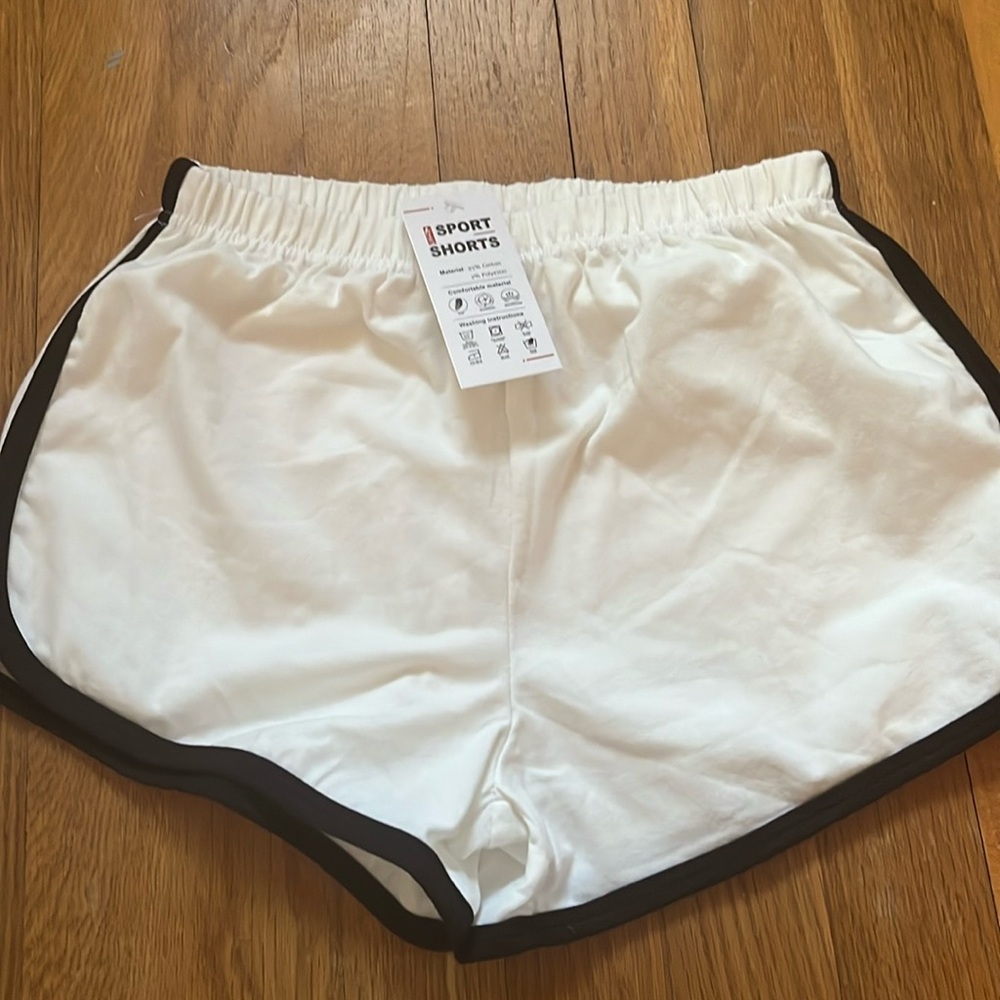 NWT White sport shorts with black trim size small